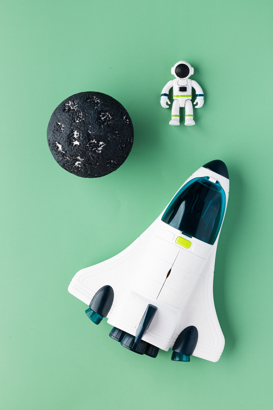 Space Ship, Astronaut and Moon on Green Background